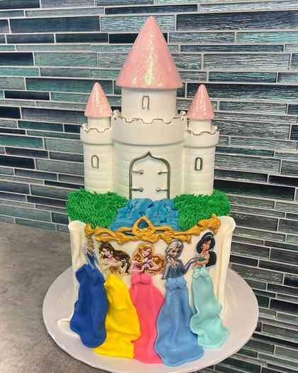 The whole castle, princesses included, a custom cake made by Aya's Sweets