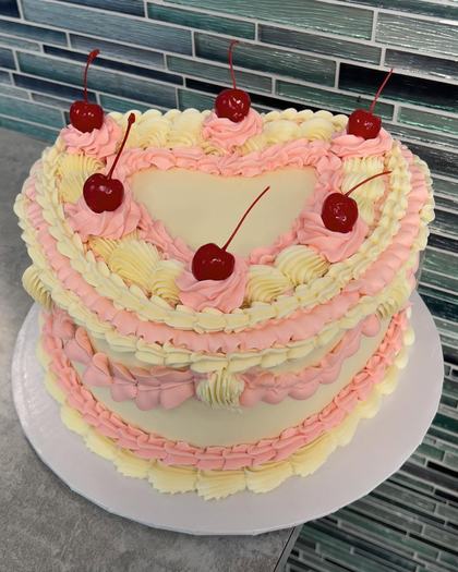 Cherries on a heart, a custom cake made by Aya's Sweets