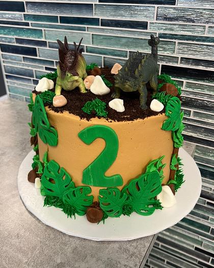 Dinosaurs, age two, a custom cake made by Aya's Sweets
