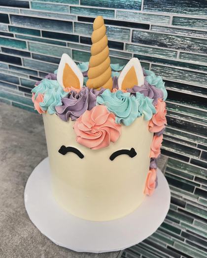 Unicorn, horn and all, a custom cake made by Aya's Sweets