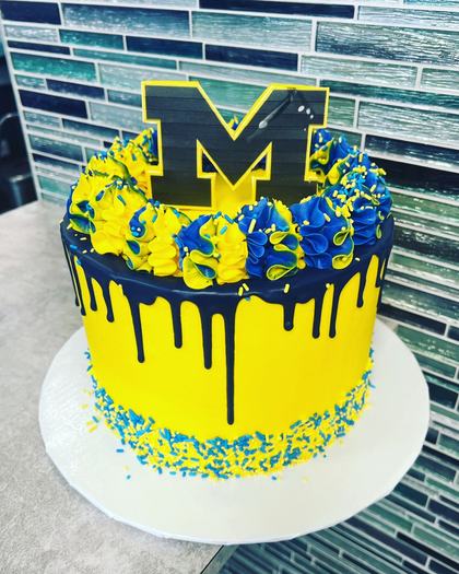 Go blue, a custom cake made by Aya's Sweets