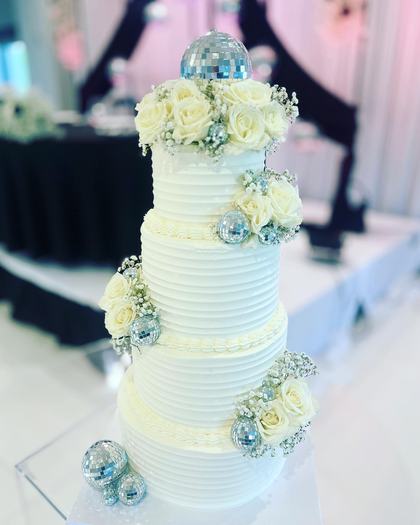 Tall, white and quiet, a cake made by Aya's Sweets