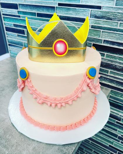 A crown and pink drapes, a custom cake made by Aya's Sweets