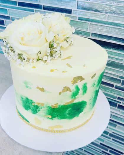 Watercolour, green and gold, a custom cake made by Aya's Sweets