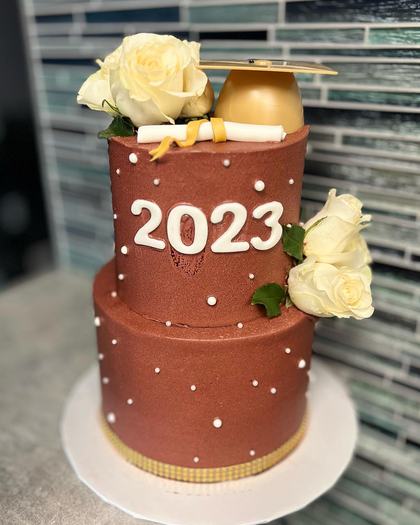 Twenty twenty three, in bronze, a custom cake made by Aya's Sweets