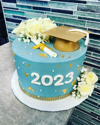 Class of 2023, a custom cake made by Aya's Sweets