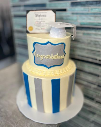 Stripes and a gold plaque, a custom cake made by Aya's Sweets
